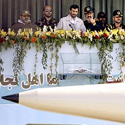 Iranian President Mahmoud Ahmadinejad (center) attends a military parade in Tehran: "We want to target the regime's economic and financial nerve centers, not the Iranian people."