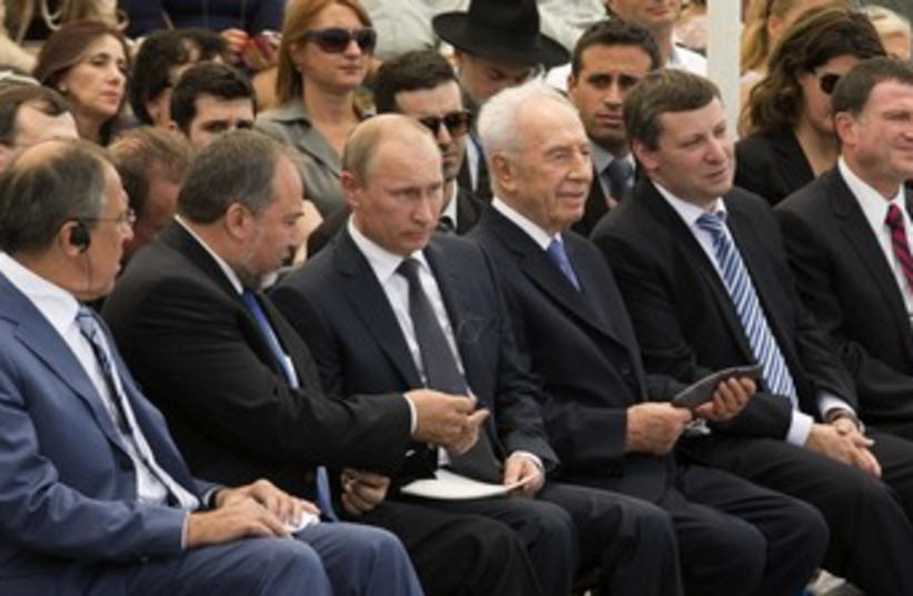 Russian President Putin attends ceremony 370 Russian President Putin attends ceremony 370 (photo credit: POOL New / Reuters)