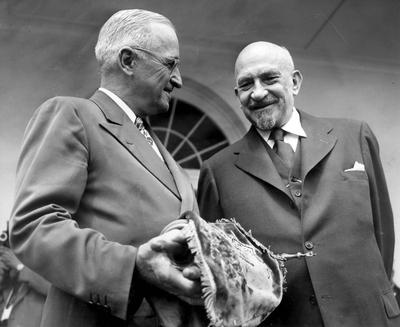 President Harry S. Truman and Israeli President Dr. Chaim Weizmann. Truman is holding a blue velvet mantle embellished with the Star of David. The mantle was a gift symbolizing Israel's gratitude for American recognition of and support for the new nation. President Harry S. Truman and Israeli President Dr. Chaim Weizmann. Truman is holding a blue velvet mantle embellished with the Star of David. The mantle was a gift symbolizing Israel's gratitude for American recognition of and support for the new nation.